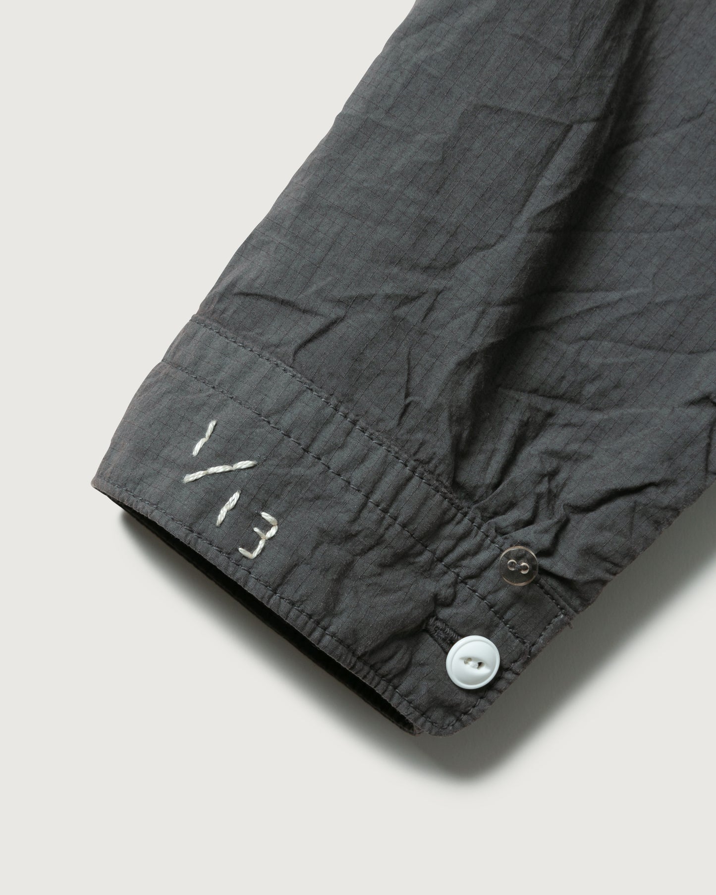 HAND-EMBROIDERED MESSAGE SHIRT (LIMITED)