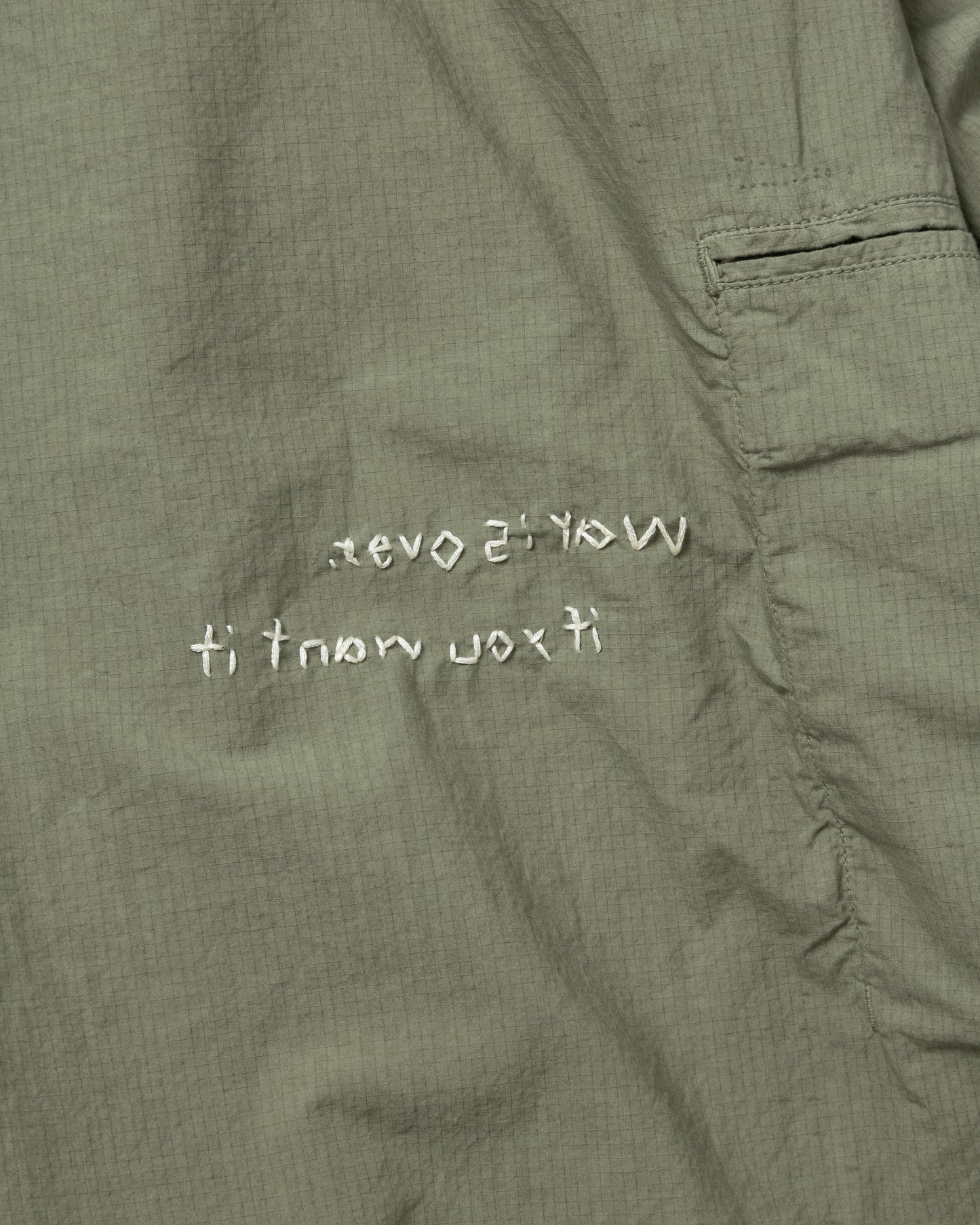 HAND-EMBROIDERED MESSAGE SHIRT (LIMITED)